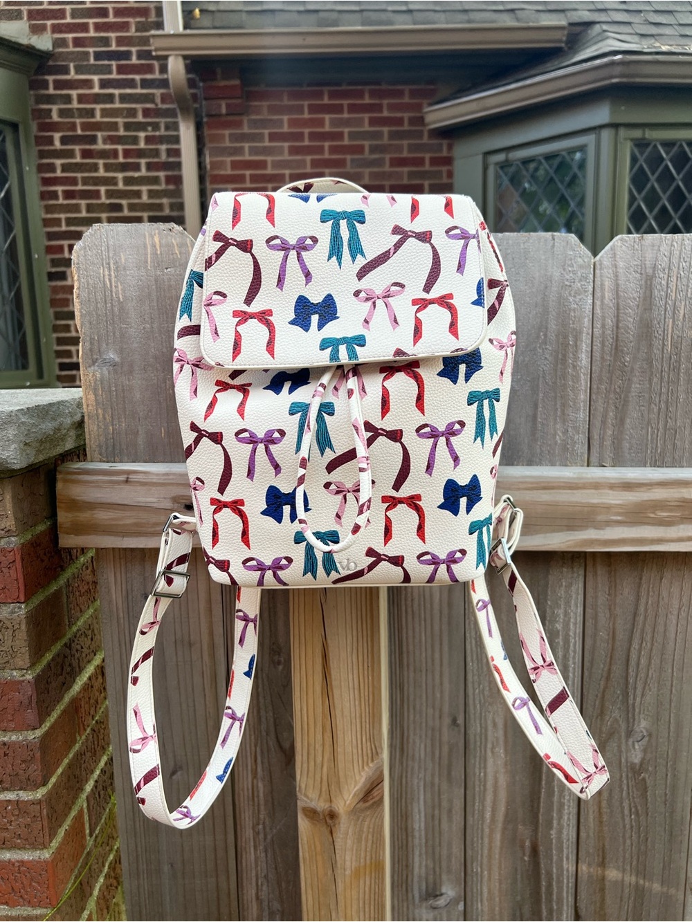 NWT Vera Bradley Rows of Bows Faux Leather Drawstring Backpack